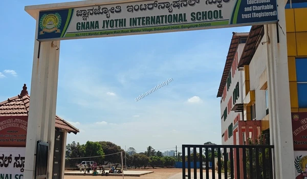 The modern multi-colored facade of the Gnana Jyothi International School building serving the community around Sobha World City