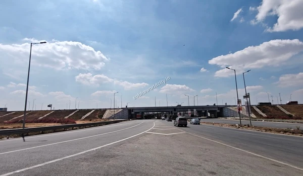 A wide-angle shot of the underpass that forms a primary access route to Sobha World City.