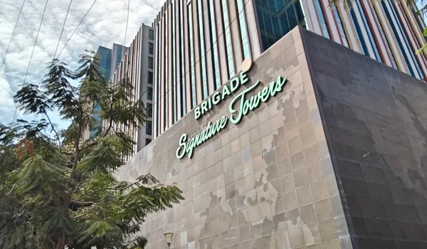 Exterior view of Brigade Signature Towers representing major tech parks near Sobha World City