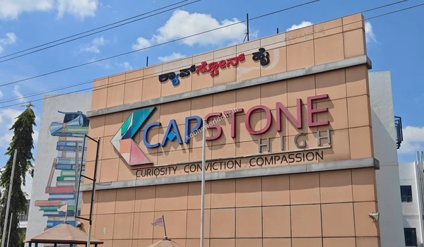 The impressive building of Capstone High school, offering top-tier academics and holistic development close to Sobha World City.