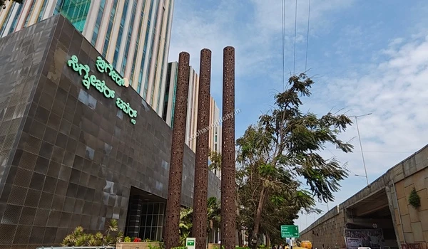 Looking up at the major commercial centers and office spaces neighboring the Sobha World City project