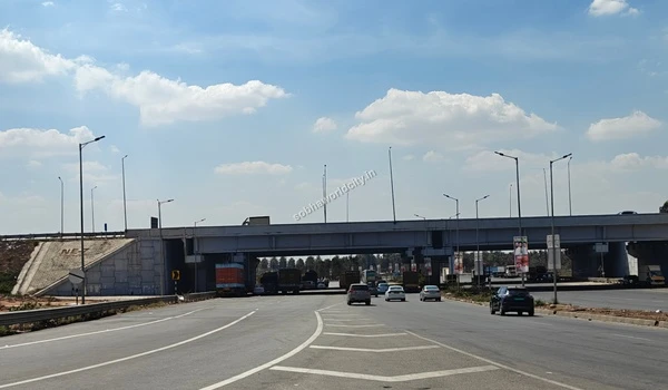 This busy underpass acts as a vital connectivity hub for the Sobha World City area.