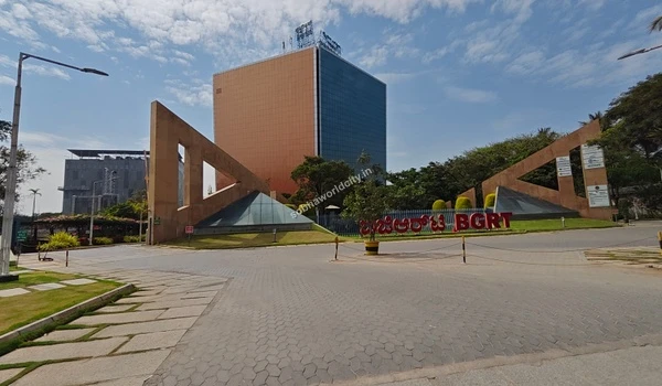 View of the towering commercial office spaces at Bearys Global Research Triangle representing the elite professional environment near Sobha World City