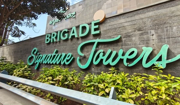 Modern architecture of the nearby Brigade Signature Towers representing the major corporate offices close to Sobha World City
