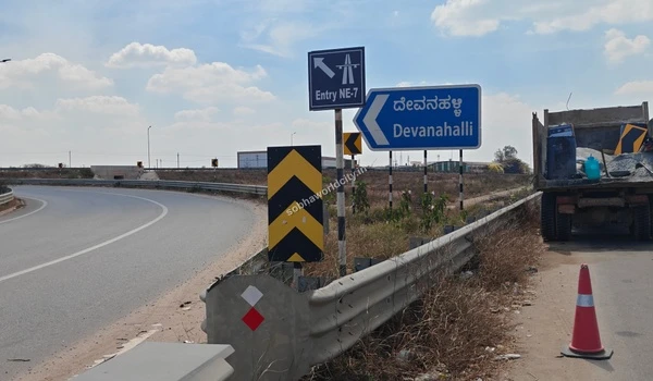 Highway safety markers and directional boards for Devanahalli and NE-7, ensuring an effortless and straightforward drive for Sobha World City residents.