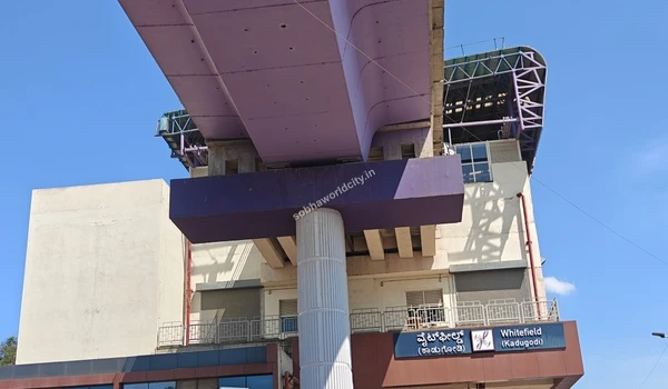 The impressive elevated metro infrastructure and station signage at Whitefield providing rapid transit for Sobha World City