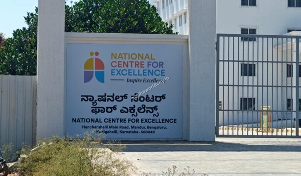 A clear close up view of the National Centre for Excellence signage displaying the premium academic focus near Sobha World City