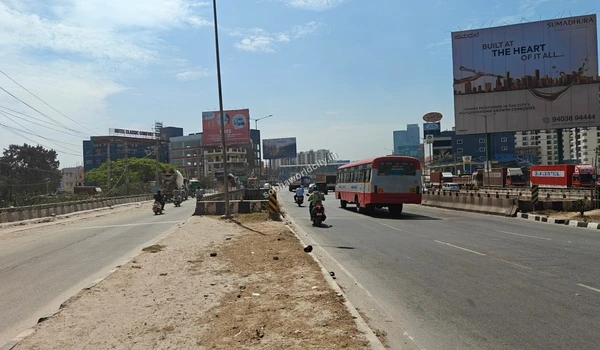 Wide multi-lane road at the Sobha World City gateway ensuring congestion-free travel to KR Puram