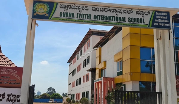 Main entrance gate of Gnana Jyothi International School highlighting the premium educational hubs around Sobha World City