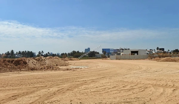 Wide angle view of the extensive ground preparation and soil tracking for Sobha World City