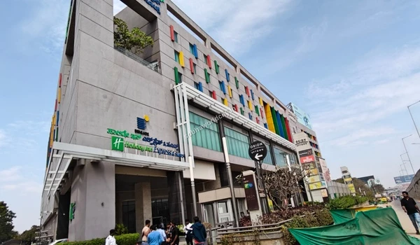 An iconic clock tower standing tall at a commercial complex just a short drive away from the gates of Sobha World City