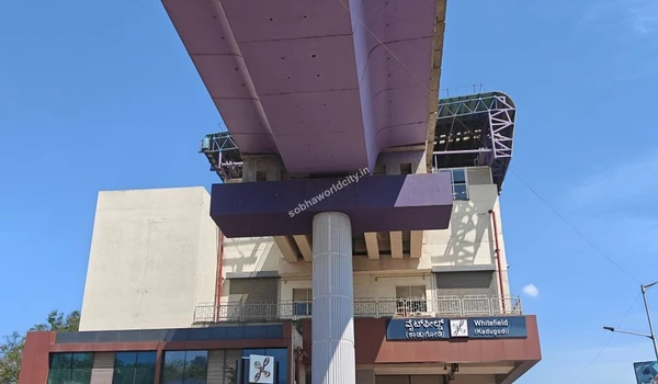 Detailed shot of the prominent Whitefield Kadugodi transit name board ensuring clear landmark visibility for Sobha World City visitors