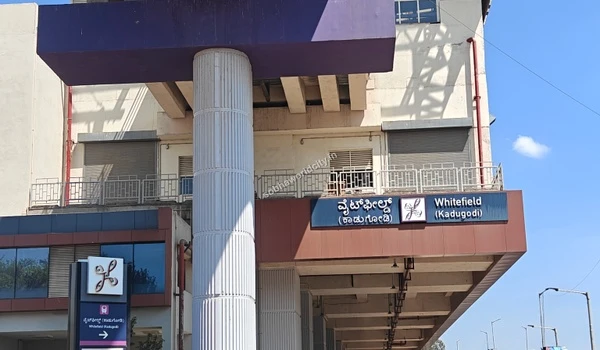 Close up architectural view of the Whitefield Kadugodi metro station pillar and purple viaduct serving Sobha World City