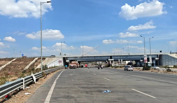 Transit view along the Kolar highway underpass coming from KR Puram, demonstrating the seamless travel experience to Sobha World City