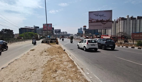 Expansive view of the main approach road from Sobha World City leading directly towards the KR Puram hub