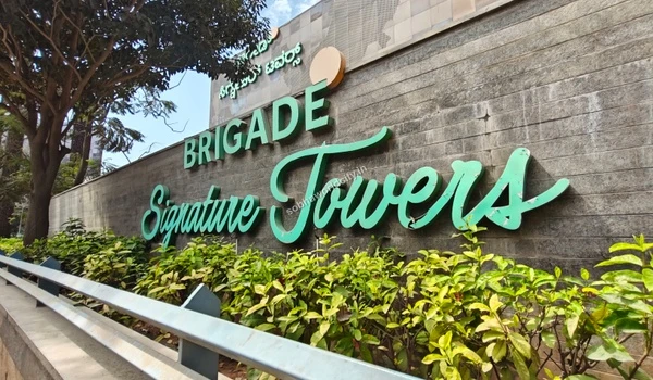 Exterior facade of Brigade Signature Towers highlighting the booming IT hubs accessible from Sobha World City