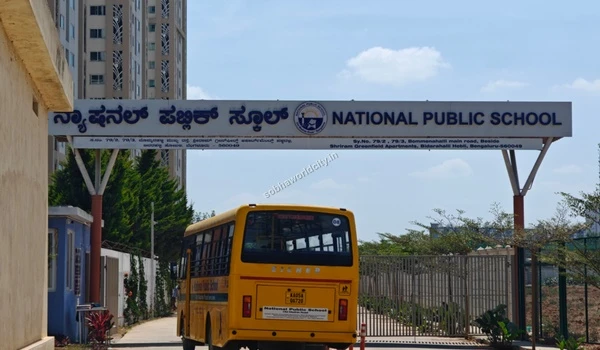 Entrance to the National Public School campus featuring secure transport options, ideally located for families residing at Sobha World City.