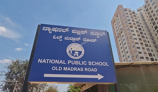 Guidance board for National Public School on Old Madras Road, an important landmark for the Sobha World City community.