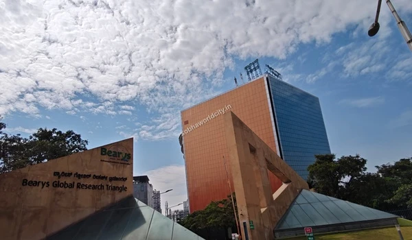 Modern entrance architecture of the nearby Bearys tech park showcasing the excellent business infrastructure close to Sobha World City