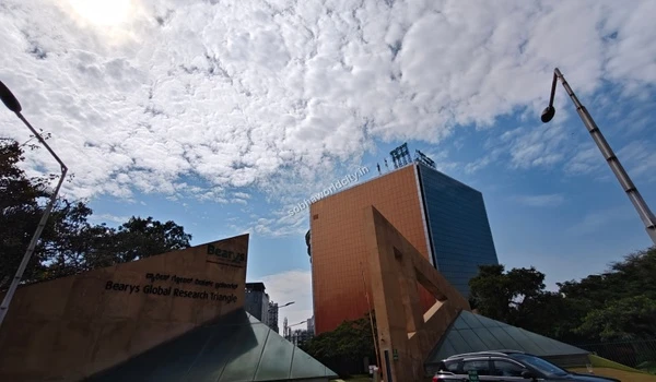 Clear sky over the commercial tech zones near Brigade Signature Towers, indicating the elite professional workspaces around Sobha World City