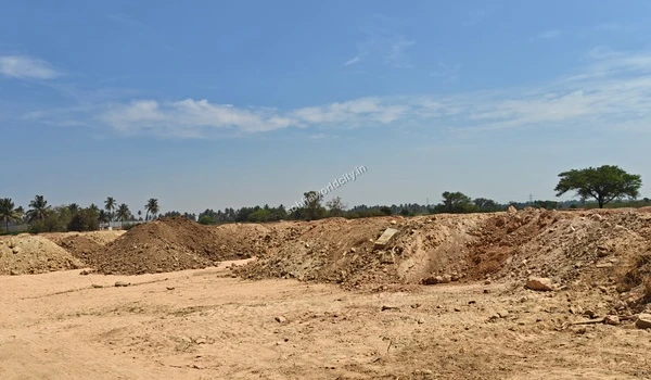 Heaps of dry rocky soil and raw construction dirt gathered across the expansive property of Sobha World City