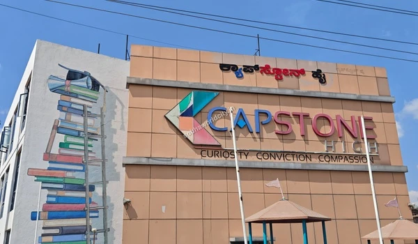 Artistic mural and architecture of Capstone High School, one of the many reputable learning centers situated near the Sobha World City development.
