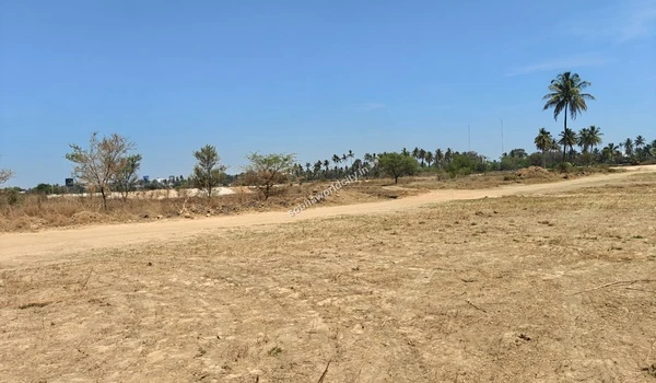 View of the initial site clearing and leveling process for the upcoming Sobha World City project