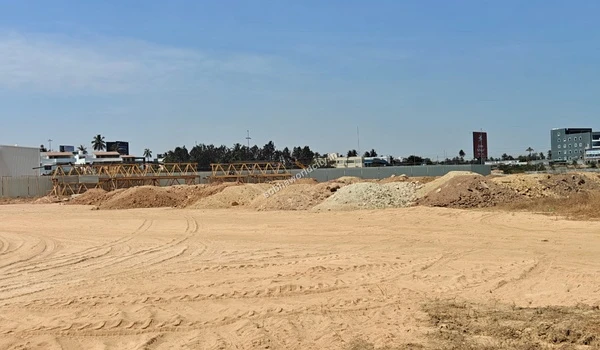 Large mounds of excavated soil gathered during the initial groundwork phase at Sobha World City