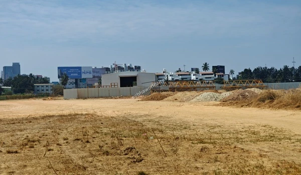 Long continuous ridge of excavated brown soil at Sobha World City
