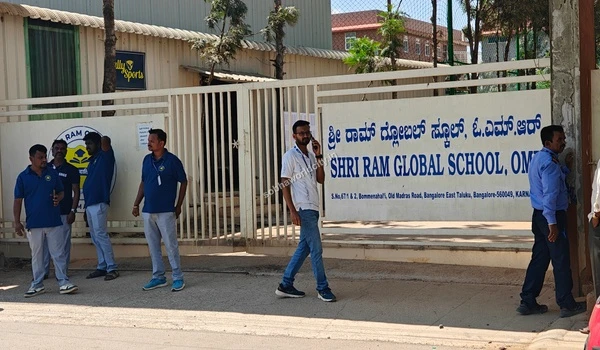Parents conversing near the entrance of Shri Ram Global highlighting the great social infrastructure around Sobha World City