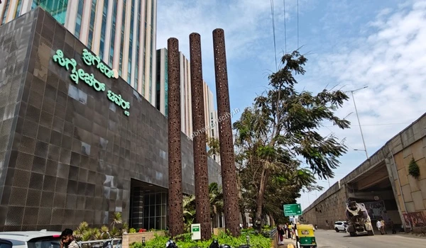 View of the modern facade at Brigade Signature Towers, a major IT hub located seamlessly near Sobha World City