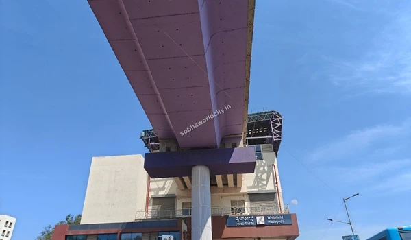 Wide angle perspective of the Whitefield Kadugodi transit hub facade highlighting the excellent local connectivity for Sobha World City