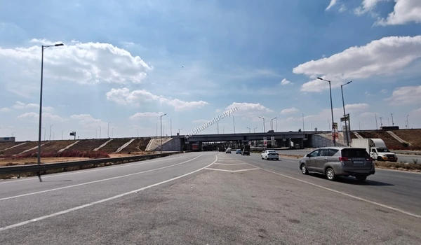 Well-developed road infrastructure featuring a major underpass near Sobha World City.