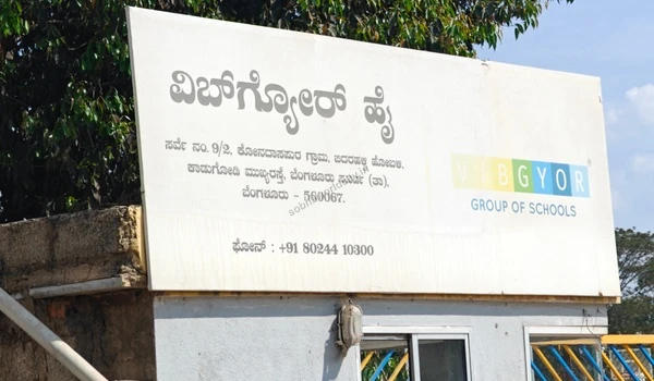 Prominent signboard for VIBGYOR Group of Schools, representing the top-tier schooling options and robust social infrastructure available in close proximity to Sobha World City.