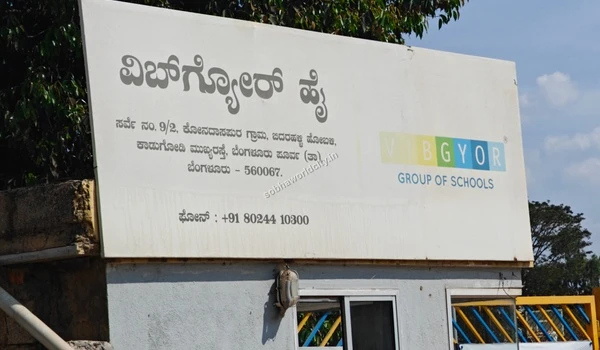 Close-up of VIBGYOR Group of Schools signage, emphasizing the excellent connectivity and short commute for families residing at Sobha World City.